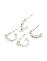 Showcasing celestial star diamante hoop earrings in a 2-pack with silver finish front view - link has visual effect only