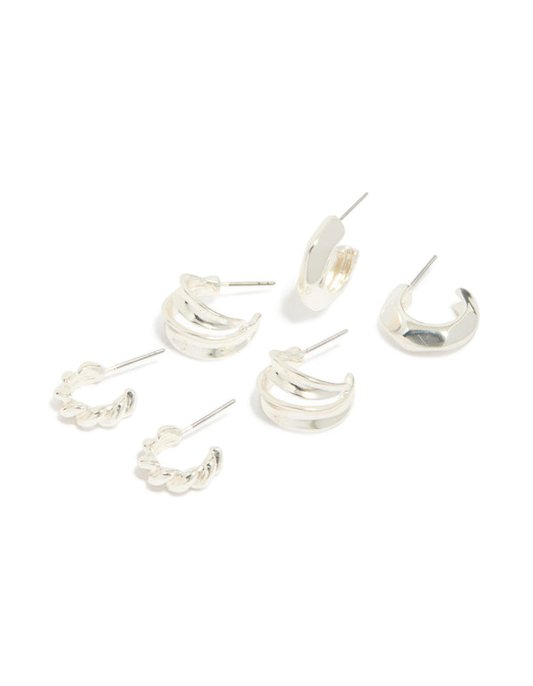 Showcasing silver chubby and textured huggie earrings in a 3-pack front view