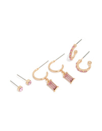 Featuring gold hoop and stud earrings in a 3-pack with light pink diamante accents front view - link has visual effect only