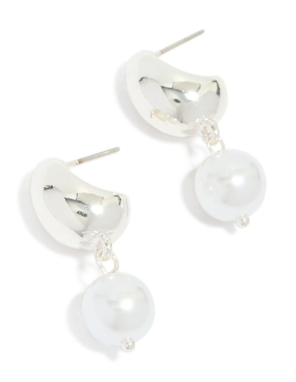 Showcasing silver pearl and bubble huggie earrings with white accents front view