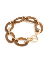 Showcasing a statement bracelet with bar detailing in gold and tan, featuring a T-bar toggle closure front view - link has visual effect only