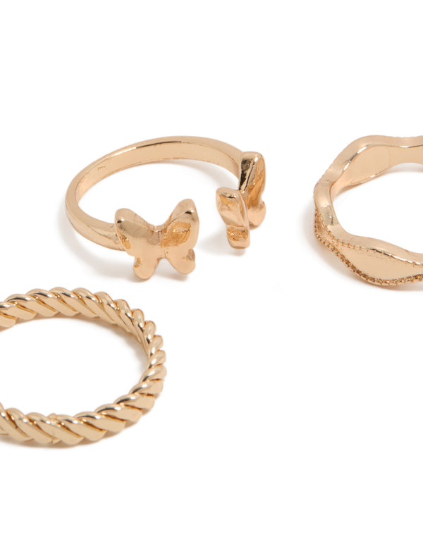 Crafted from gold butterfly and twisted rings 3-pack close up view
