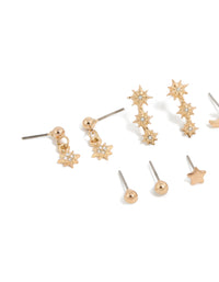 Showcasing gold diamante earrings 7-pack featuring ball star and moon designs with glitter accents and stud closure close up view - link has visual effect only