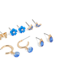 Crafted with gold blue diamante earrings 7-pack featuring flower and bow elements with huggie and stud closures post detail view - link has visual effect only