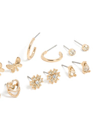 Showcasing gold diamante flower ,heart and butterfly design stud earrings 7-pack and stud closure close up view - link has visual effect only