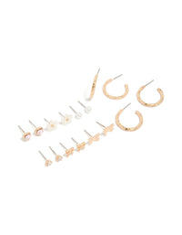 Showcasing gold earrings 8-pack featuring bow, heart, pearl and butterfly details with stud and hoop closure in ivory, pink, and silver accents front view - link has visual effect only