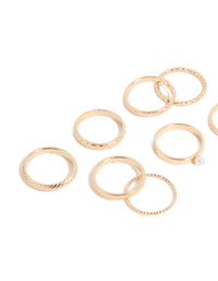 Featuring simple pearl and textured rings 10-pack crafted from gold with stackable statement styling side view - link has visual effect only