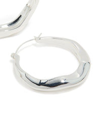 These silver plated large hoop earrings showcase polished finish close up view - link has visual effect only