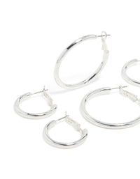 Crafted from silver plated thick hoop earrings in a statement and chunky 3-pack close up view - link has visual effect only