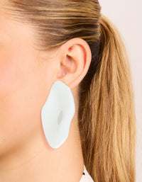 Showcasing silver plated organic wrapped large oval earrings with chunky statement design on ear view - link has visual effect only