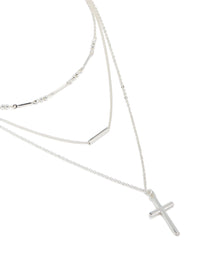 Discover this silver plated bar and cross layered necklace featuring balls, beads with dainty styling close up view - link has visual effect only