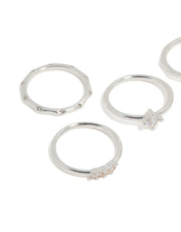 Showcasing silver plated wavy and cubic zirconia detail rings 5-pack with solitaire stone cut in crystal close up view - link has visual effect only