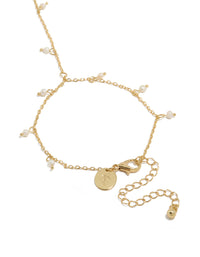 Explore this gold plated mini freshwater pearl droplet hand chain designed with charm in dainty statement style closure detail view - link has visual effect only