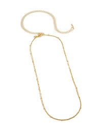 Showcasing a gold plated layered waist chain featuring a plain design with ball embellishments side view - link has visual effect only