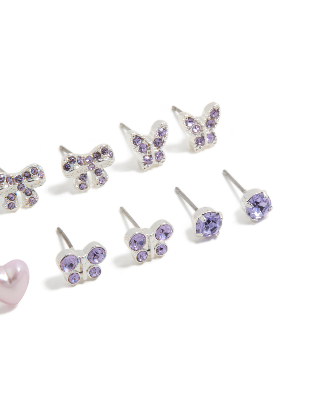 Showcasing kids diamante butterfly stud earrings 6-pack with heart, bow and star designs in silver plated finish close up view