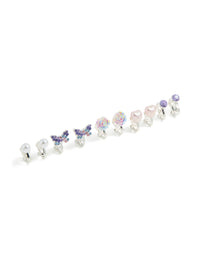 Showcasing kids clip-on earrings in a 5-pack featuring butterfly, floral, heart, and pearl designs with silver plated ombre finish in lavender, light pink, and white front view - link has visual effect only
