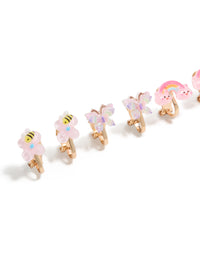Featuring kids gold garden clip on earrings with celestial, butterfly, floral and glitter elements in pink aqua yellow close up view - link has visual effect only