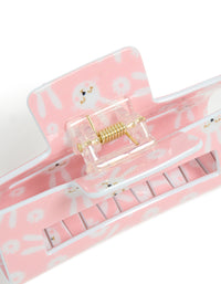 Designed with floral and animal elements, this kids pink acrylic bunny print claw clip showcases white and gold hardware detail view - link has visual effect only