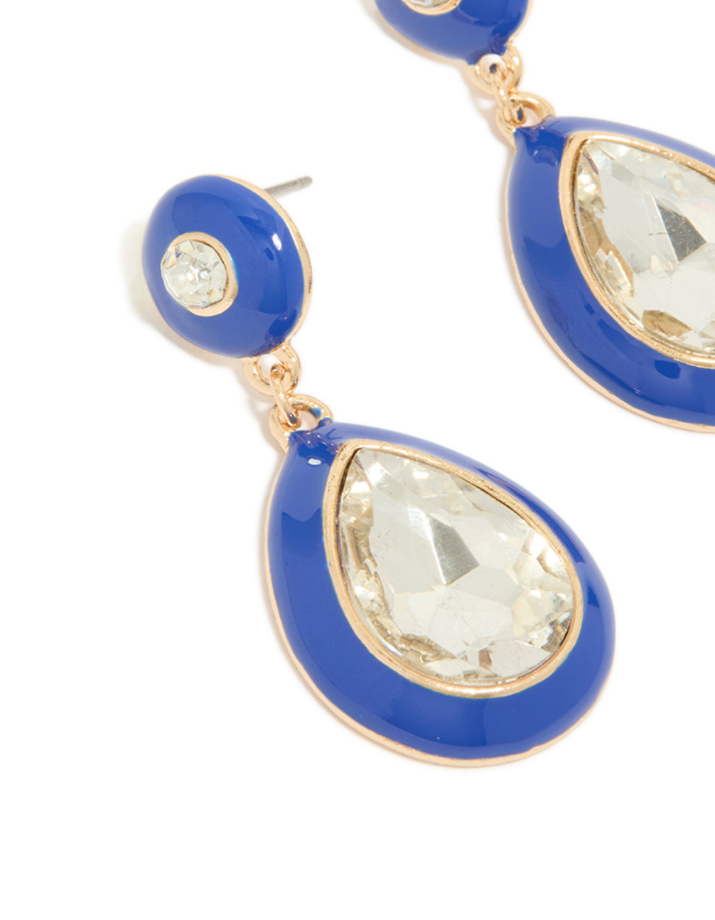 Elegant statement drop earrings featuring pear cut clear diamante stones surrounded by royal blue enamel and gold close up view