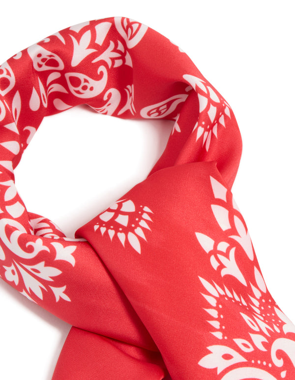 Beautifully crafted red paisley print fabric scarf in white detail view