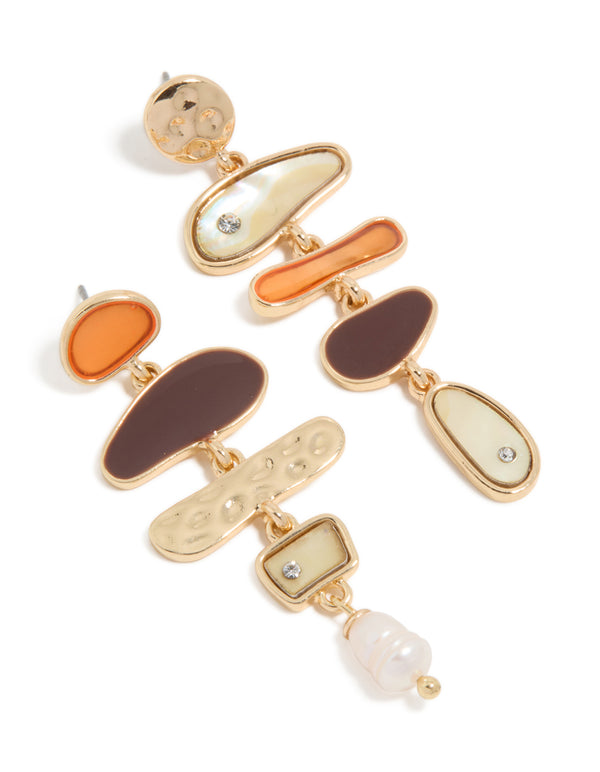 Showcasing statement drop earrings with charm ocean pearl accents in gold front view