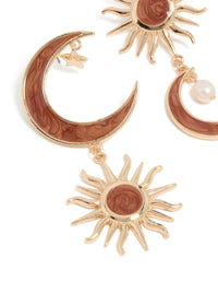 Beautifully crafted gold celestial brown marble drop earrings with pearl and charm details close up view - link has visual effect only
