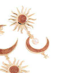 Highlighting gold celestial brown marble drop earrings featuring pearl, star and charms post detail view - link has visual effect only