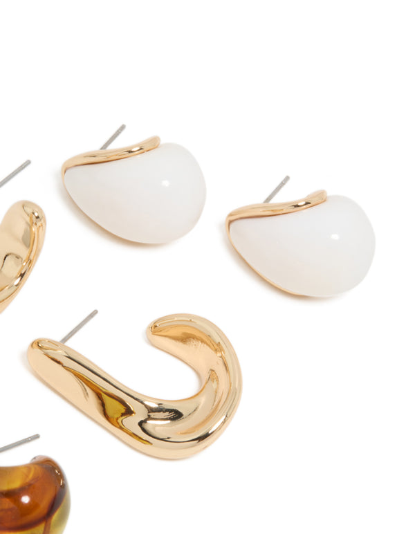 Crafted with gold brown and white acrylic stud earrings in a 3 pack post detail view