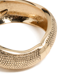 Discover a gold dotted boho hinged statement bangle close up view - link has visual effect only