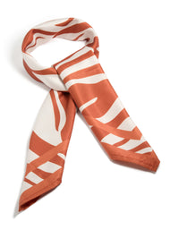 Beautifully crafted white and orange lined fabric scarf featuring abstract print in coral and ivory side view - link has visual effect only