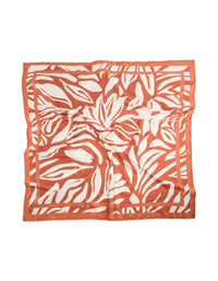 Showcasing a white and orange lined fabric scarf with abstract print in coral and ivory front view - link has visual effect only