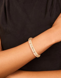 Elegant gold ribbed diamante stretch bracelet on wrist view - link has visual effect only