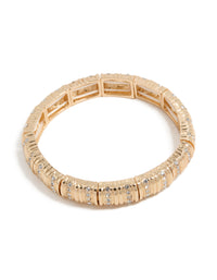 Showcasing a gold ribbed diamante stretch bracelet front view - link has visual effect only