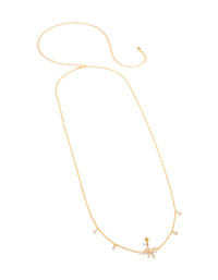 Crafted from gold plated surgical steel with cubic zirconia pavé bow chain belly bar featuring charm belly view - link has visual effect only