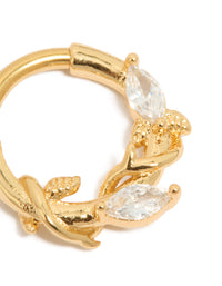 Featuring gold plated titanium clicker ring with leaf design and cubic zirconia stones detail view - link has visual effect only