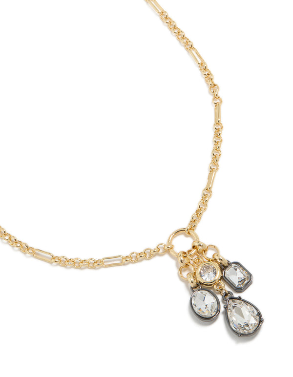 Discover this mixed metal plated diamante cluster drop necklace with cubic zirconia, and statement gold design close up view