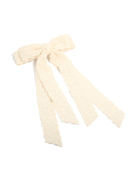 Discover a charming bow clip with floral lace fabric in ivory front view - link has visual effect only