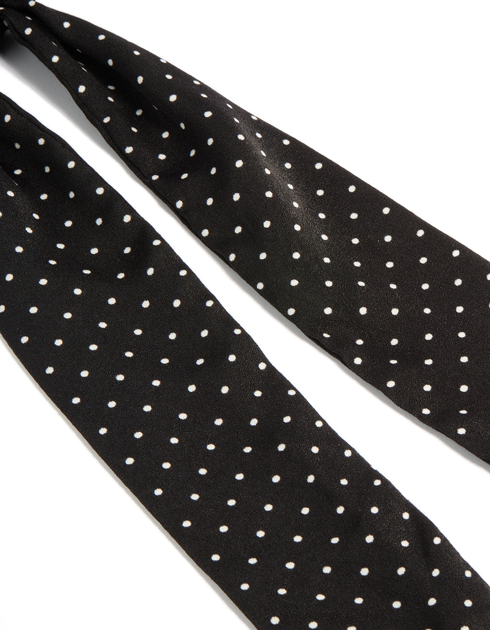 Crafted from polkadot fabric micro spot long scarf in black and white detail view