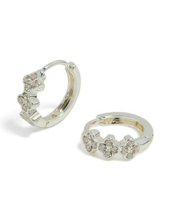 Discover these dainty waterproof stainless steel cubic zirconia triple flower huggie earrings with crystal details in silver front view