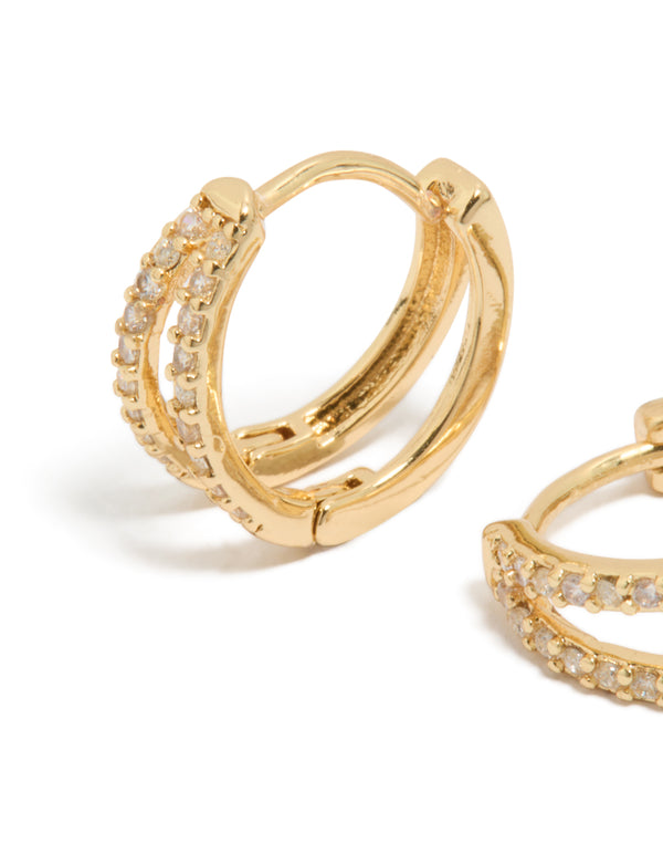 Discover small double layered huggie earrings featuring cubic zirconia in silver close up view