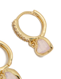 Featuring dainty gold plated cubic zirconia and pink heart drop huggie closure earrings post detail view - link has visual effect only