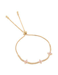 Featuring a gold plated toggle bracelet with clear and pink cubic zirconia flowers in a floral design front view - link has visual effect only