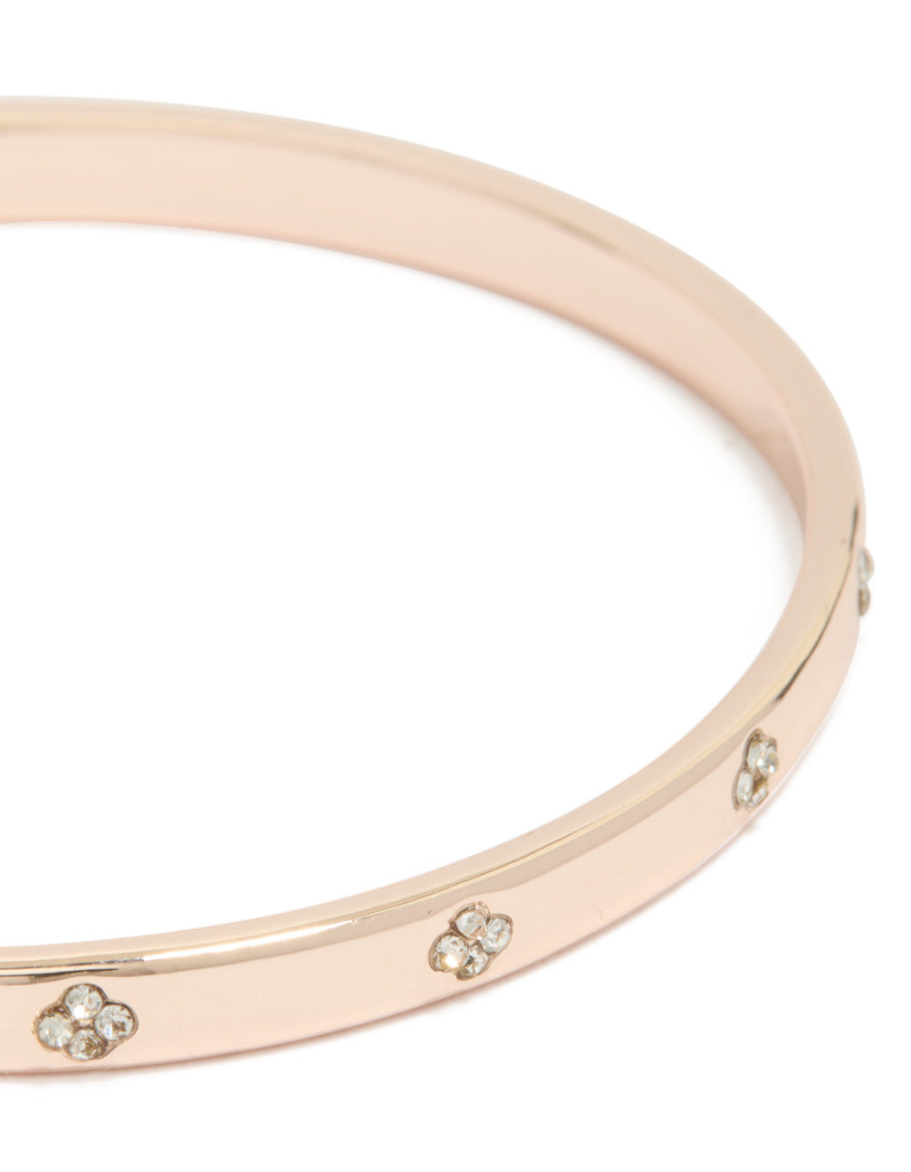 Featuring a rose gold plated diamante flowers bangle close up view
