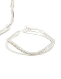 Showcasing silver diamante wavy thin hoop earrings post detail view - link has visual effect only