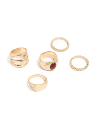 Showcasing a gold chunky ring 5-pack with maroon stone accents, and statement style front view - link has visual effect only