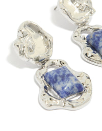 Beautifully crafted silver molten semi precious stone drop earrings with blue gemstones and detailed metalwork close up view - link has visual effect only