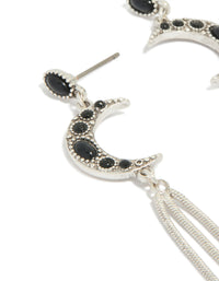 Elegant dainty silver drop earrings featuring celestial moon with black gemstone accents and tassel chain detailing close up view - link has visual effect only
