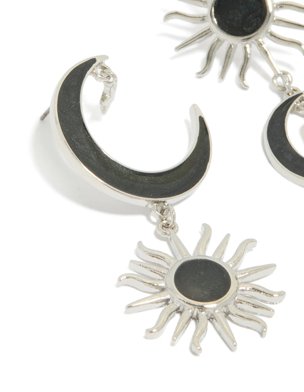 Beautifully crafted statement silver black drop earrings featuring moon and sun celestial design with pearl accents close up view