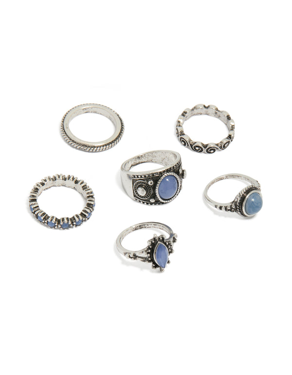 Showcasing an antique silver blue stone boho swirl stacking rings 6-pack with statement design front view