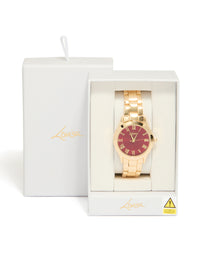 Stylish women's analog watch with brown roman numeral dial, round shape, link band strap in gold for formal occasions view - link has visual effect only